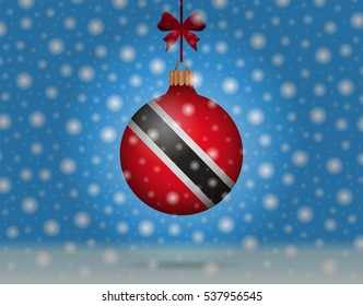 snowfall and ornament with flag of Trinidad