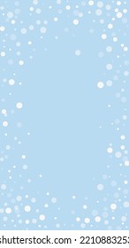 Snowfall overlay christmas background. Subtle flying snow flakes and stars on light blue winter backdrop. Festive snowfall overlay. Vertical vector illustration.