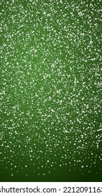 Snowfall overlay christmas background. Subtle flying snow flakes and stars on christmas green background. Festive snowfall overlay. Vertical vector illustration.