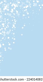 Snowfall overlay christmas background. Subtle flying snow flakes and stars on light blue winter backdrop. Festive snowfall overlay. Vertical vector illustration.