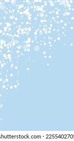 Snowfall overlay christmas background. Subtle flying snow flakes and stars on light blue winter backdrop. Festive snowfall overlay. Vertical vector illustration.