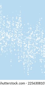 Snowfall overlay christmas background. Subtle flying snow flakes and stars on light blue winter backdrop. Festive snowfall overlay. Vertical vector illustration.