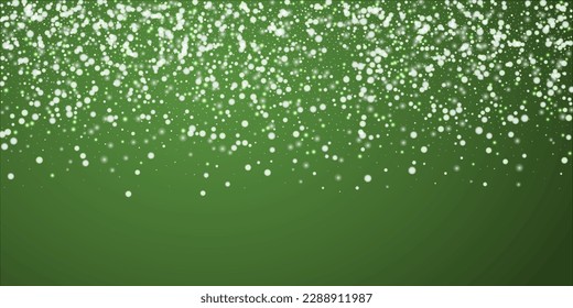 Snowfall overlay christmas background. Subtle flying snow flakes and stars on christmas green background. Festive snowfall overlay. Wide vector illustration.