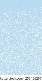 Snowfall overlay christmas background. Subtle flying snow flakes and stars on light blue winter backdrop. Festive snowfall overlay. Vertical vector illustration.