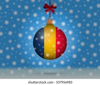snowfall and snowball with flag of romania