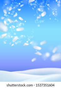 Snowfall winter Christmas background with blue sky.