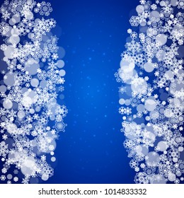 Snowflake border for Christmas and New Year celebration. Holiday snowflake border on blue background with sparkles. For banners, gift coupons, vouchers, ads, party events. Falling frosty snow.
