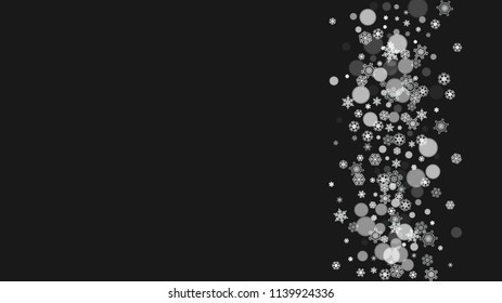 Snowflake border for Christmas and New Year holidays. Horizontal snowflake border on black background. For banners, gift coupons, vouchers, ads, party events. Falling frosty snow.
