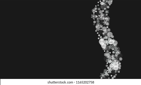 Snowflake border for Christmas and New Year holidays. Horizontal snowflake border on black background. For banners, gift coupons, vouchers, ads, party events. Falling frosty snow.