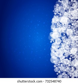 Snowflake border for Christmas and New Year celebration. Holiday snowflake border on blue background with sparkles. For banners, gift coupons, vouchers, ads, party events. Falling frosty snow.