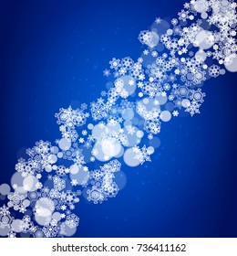 Snowflake border for Christmas and New Year celebration. Holiday snowflake border on blue background with sparkles. For banners, gift coupons, vouchers, ads, party events. Falling frosty snow.