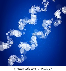 Snowflake border for Christmas and New Year celebration. Holiday snowflake border on blue background with sparkles. For banners, gift coupons, vouchers, ads, party events. Falling frosty snow.