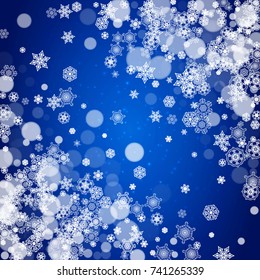 Snowflake border for Christmas and New Year celebration. Holiday snowflake border on blue background with sparkles. For banners, gift coupons, vouchers, ads, party events. Falling frosty snow.