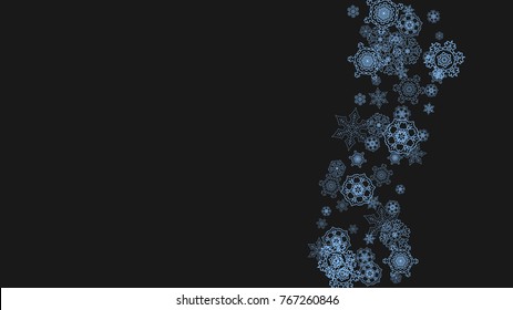 Snowflake border for Christmas and New Year celebration. Holiday snowflake border on black background  with sparkles. For banners, gift coupons, vouchers, ads, party events. Horizontal frosty snow.
