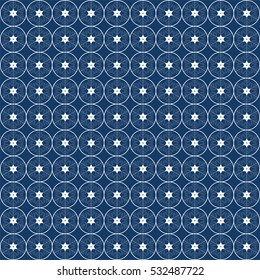 Snowflake in a circle on a blue background