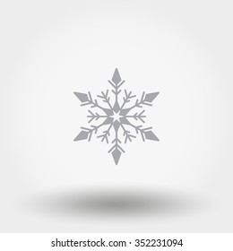 Snowflake. Grey icon for web and mobile application. Vector illustration on a white background. Flat design style.