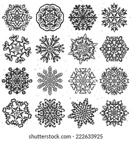 Snowflake hand drawn vectors. Set of 16 isolated elements on white background. Template for christmas winter design