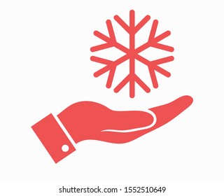 Snowflake in hand icon. 