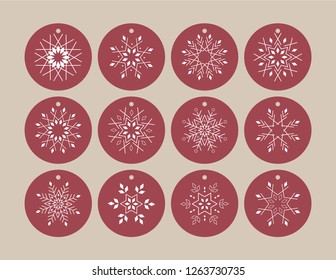 Snowflake hang tag printable. 12 unique snowflake designs on round tags. Eash tag is 2x2inch, when printed on 8.5x11" or A4 size. Use as gift tags or hang tags and write your message on the back.