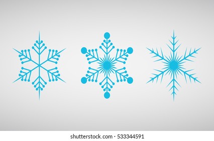 Snowflake icon graphic. Blue snowflakes on light background . Set of icons of snowflakes. Vector illustration.