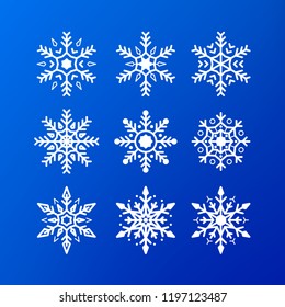 Snowflake icon set. white color snowflakes isolated on blue background. Winter christmas snowflake crystal decoration element. Xmas frost flat isolated silhouette symbol. Vector illustration