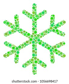 Snowflake mosaic of filled circles in various sizes and eco green color tones. Vector round elements are combined into snowflake collage. Eco design concept.
