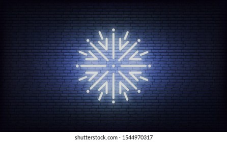 Snowflake neon icon. Vector glowing neon white snow icon.