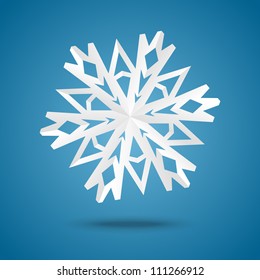 Snowflake origami on blue background