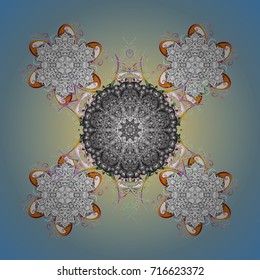 Snowflake ornament Vector illustration. Mandala isolated. Snowflake ornament object. Snowflake ornament on a yellow and blue background.