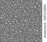 A snowflake pattern is shown on a white background. The snowflakes are scattered all over the image, creating a sense of movement and energy. Scene is one of excitement and joy
