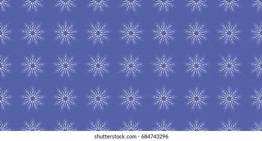 Snowflake seamless pattern. Snowflakes on a blue background. Seamless pattern for Christmas and New Year cards or packaging.