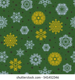 Snowflake seamless pattern. Snowflakes pattern. Vector snowflakes background. Flat design with abstract snowflakes isolated on green background.