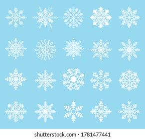 Schneeflocken auf weißem Hintergrund einzeln auf blauem Hintergrund. Winterweihnachtsfest mit schneeflackerndem Kristallelement.