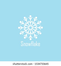 Snowflake sign on a blue background.