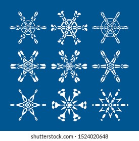 Snowflake vector in white color icons on blue background. White christmas snow flat crystallic elements. Illustration of ice collection. Isolated xmas frost snowflakes.