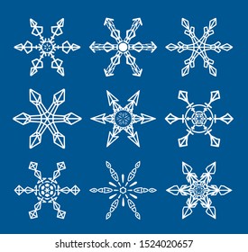 Snowflake vector in white color icons on blue background. White christmas snow flat crystallic elements. Illustration of ice collection. Isolated xmas frost snowflakes.