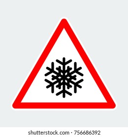 snowflake, warning triangle road sign