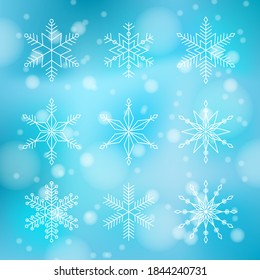 Colección de conjuntos de invierno con copos de nieve aislados en un fondo de bokeh azul. Iconos de nieve, silueta para la bandera de Navidad y Año Nuevo, tarjetas. Vector e ilustración.