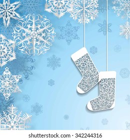 Snowflakes background with christmas socks on blue background