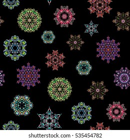 Snowflakes background. Winter card Merry Christmas, New Year and Happy Holiday vector illustration. Christmas card with green, pink and neutral snowflakes on black background.