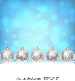 Snowflakes border with silver Christmas balls on shiny blue background