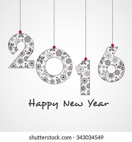 Snowflakes decorated hanging text 2016 on glossy grey background for Happy New Year celebration.