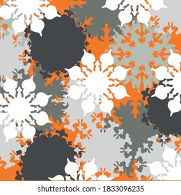 Snowflakes with different shapes on the orange background