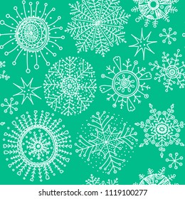 Snowflakes doodle pattern. Vector christmas snow flakes seamless background. Winter xmas and new year ornament. Seasonal hand drawn decoration. Doodling hand drawn icons.