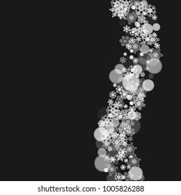 Snowflakes falling on black background. Merry Christmas and Happy New Year theme. Frosty falling snowflakes for banners, gift cards, party invitations, partner compliments and special business offers.