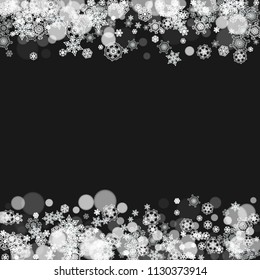 Snowflakes falling on black background. Merry Christmas and Happy New Year theme. Frosty falling snowflakes for banners, gift cards, party invitations, partner compliments and special business offers.