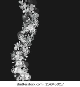 Snowflakes falling on black background. Merry Christmas and Happy New Year theme. Frosty falling snowflakes for banners, gift cards, party invitations, partner compliments and special business offers.