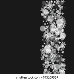Snowflakes falling on black background. Merry Christmas and Happy New Year theme. Frosty falling snowflakes for banners, gift cards, party invitations, partner compliments and special business offers.