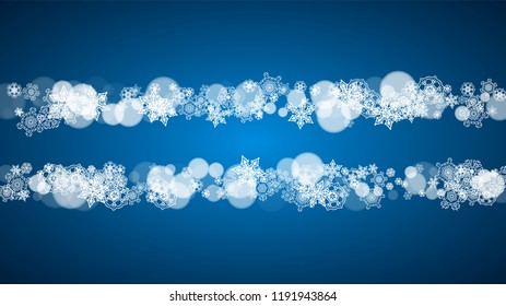 Snowflakes falling on blue background. Christmas and New Year horizontal theme. Frosty falling snowflakes for banners, gift card, party invitation, compliments and special business offer