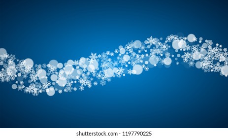 Snowflakes falling on blue background. Christmas and New Year horizontal theme. Frosty falling snowflakes for banners, gift card, party invitation, compliments and special business offer
